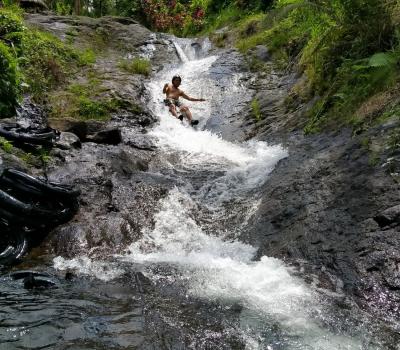 How Fun Is Natural Water Sliding and Pool Jumping at Sekumpul Waterfall?