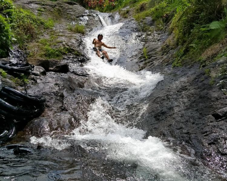 How Fun Is Natural Water Sliding and Pool Jumping at Sekumpul Waterfall?