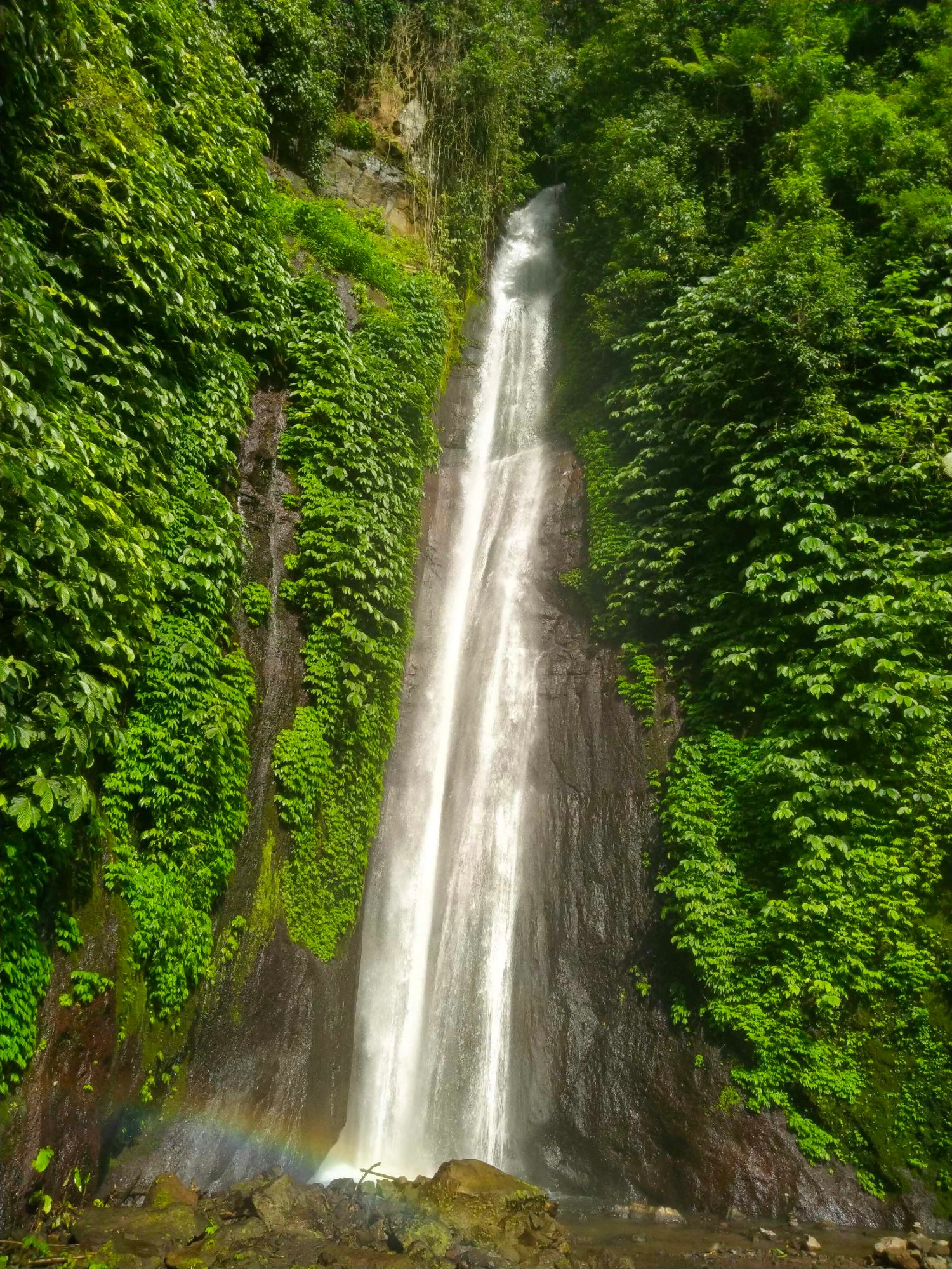 Welcome to Bali's Hidden Paradise: Exploring the Beauty of Munduk Waterfall.